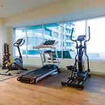 Comfy And Warm Studio Grand Kamala Lagoon Apartment By Travelio