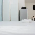 Comfy And Warm Studio Grand Kamala Lagoon Apartment By Travelio