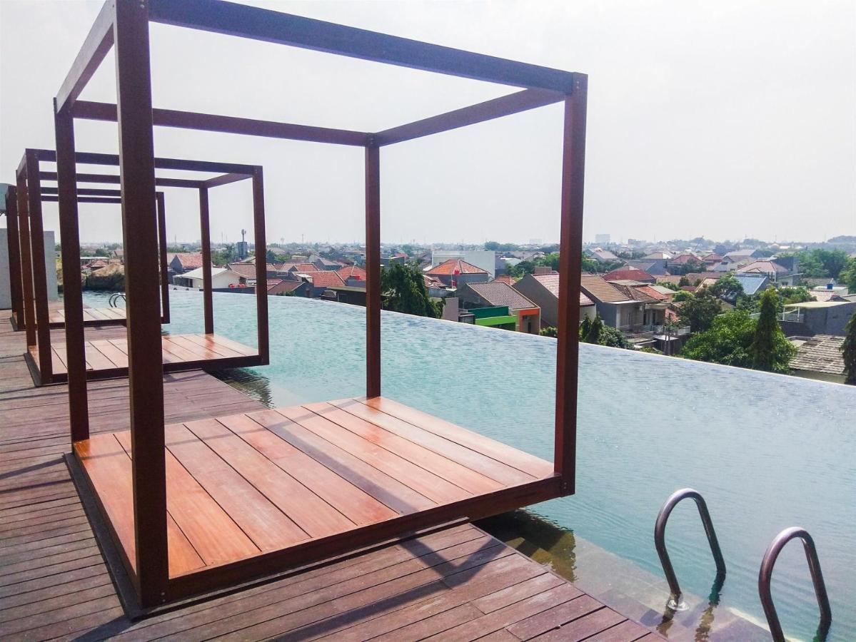 Apartemen Comfy And Warm Grand Kamala Lagoon By Travelio